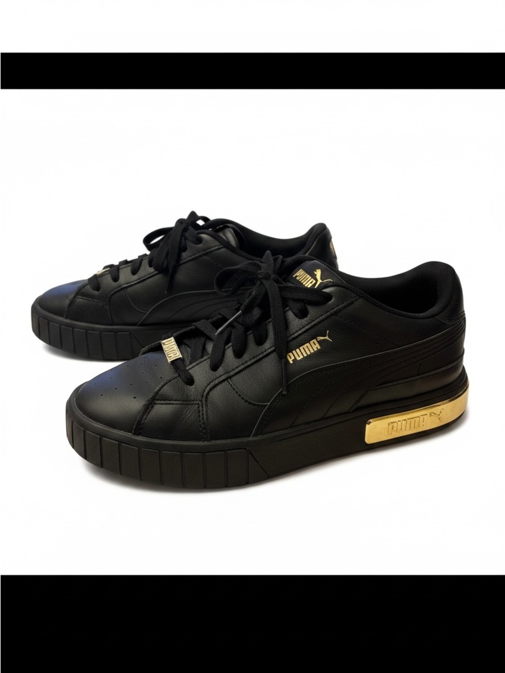 Puma Black Low-Top Sneakers with Gold Accents